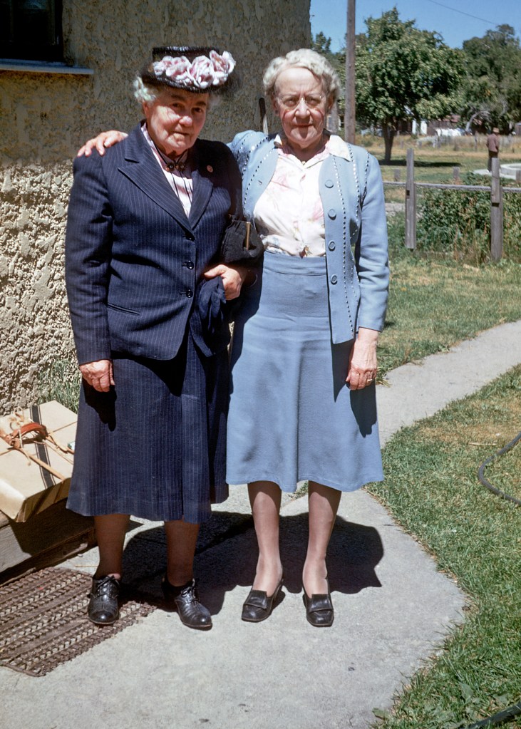My great-grandmother (light blue dress) and her sister 1950s.